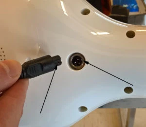 Power cord plug groove & socket tab